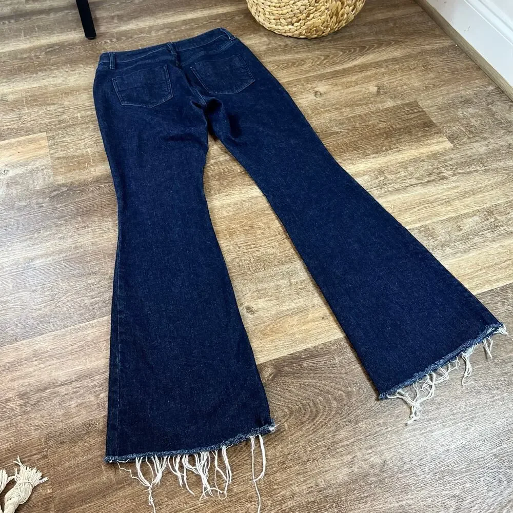 Antonio Melani NWOT dark wash flare raw hem jeans